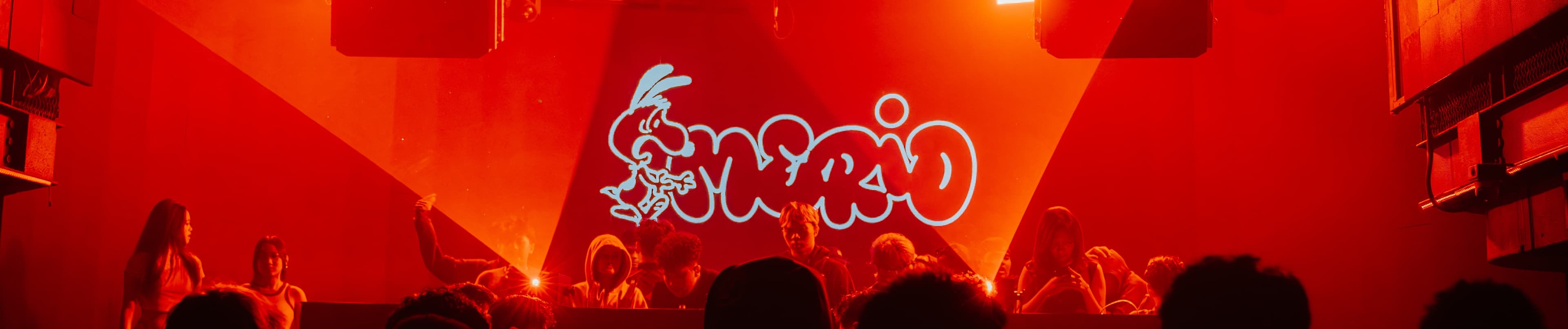 Banner asli MERIO dari SoundCloud: panggung berwarna merah dengan wordmark MERIO